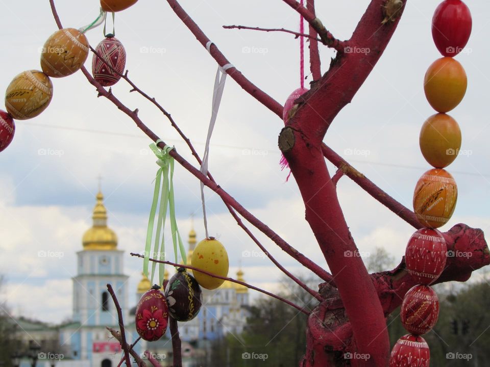 Painted Easter eggs on the background of the church