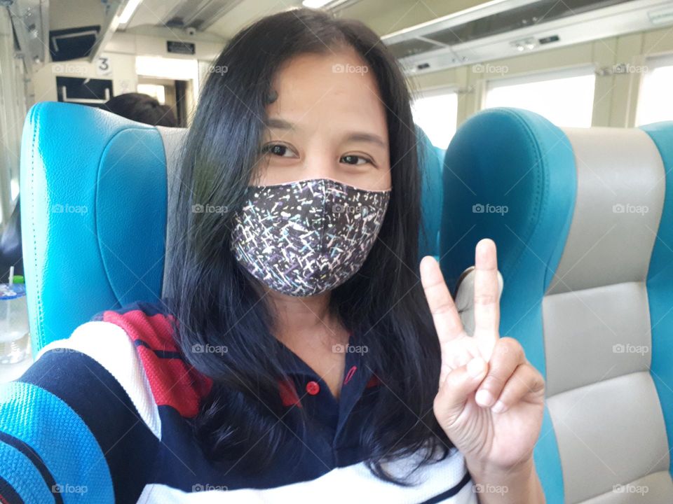 beautiful woman selfie in executive class train