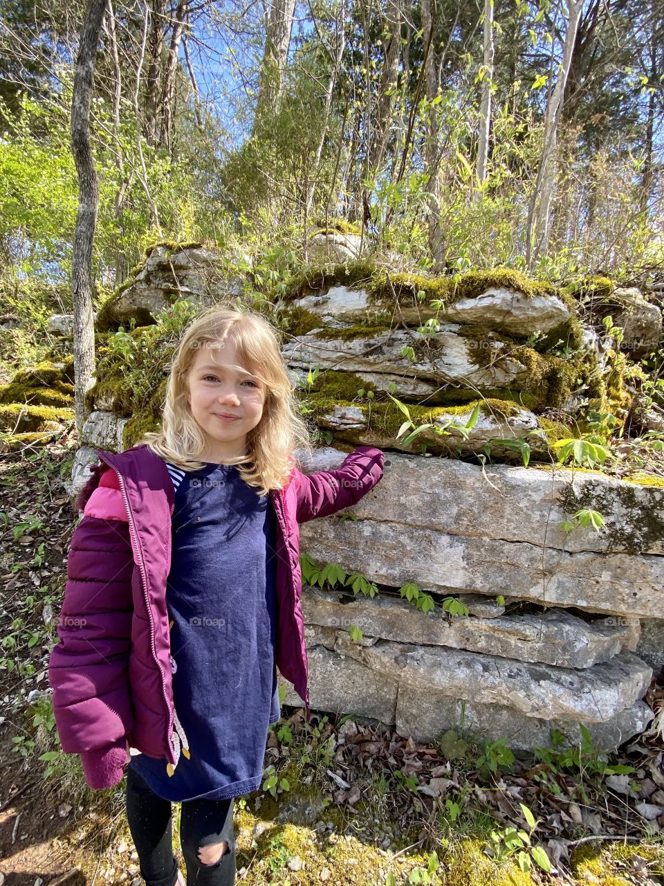 A little girl, happy that the weather is finally starting to warm up!