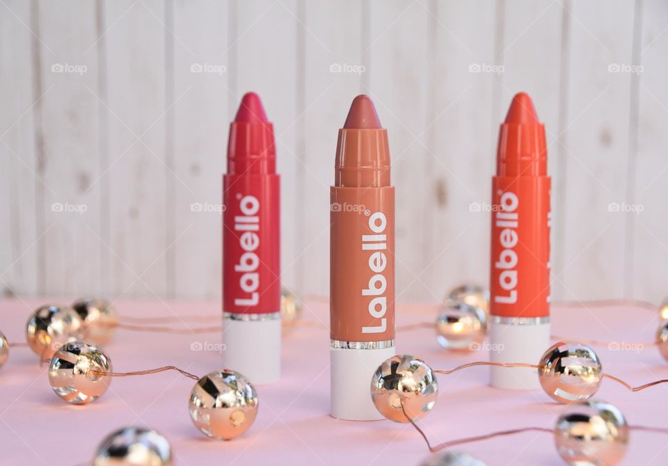 Labello lipsticks against white background 