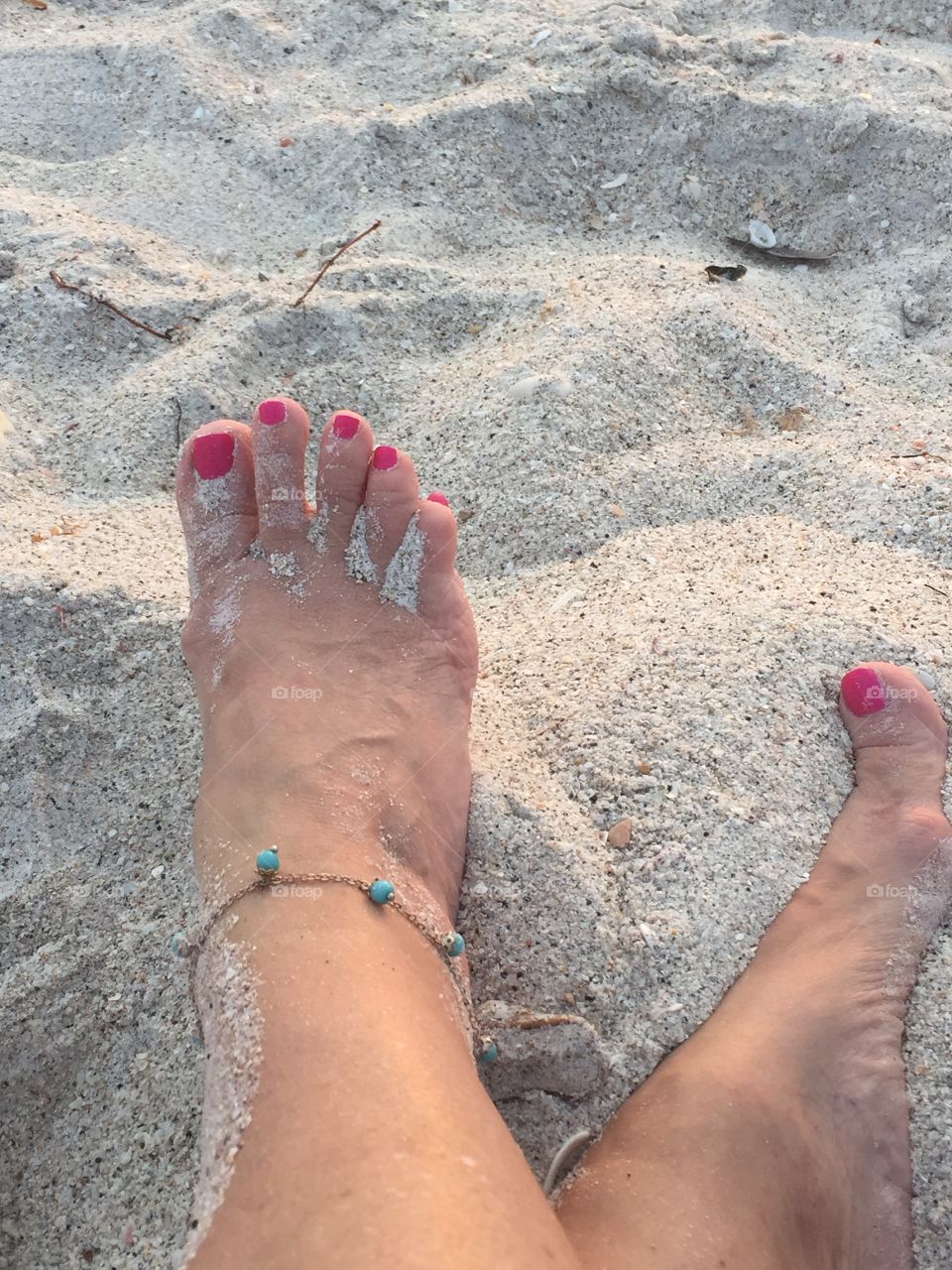 Feet on the sand