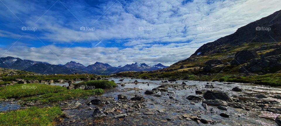 Alpine rivers flowing down the mountain