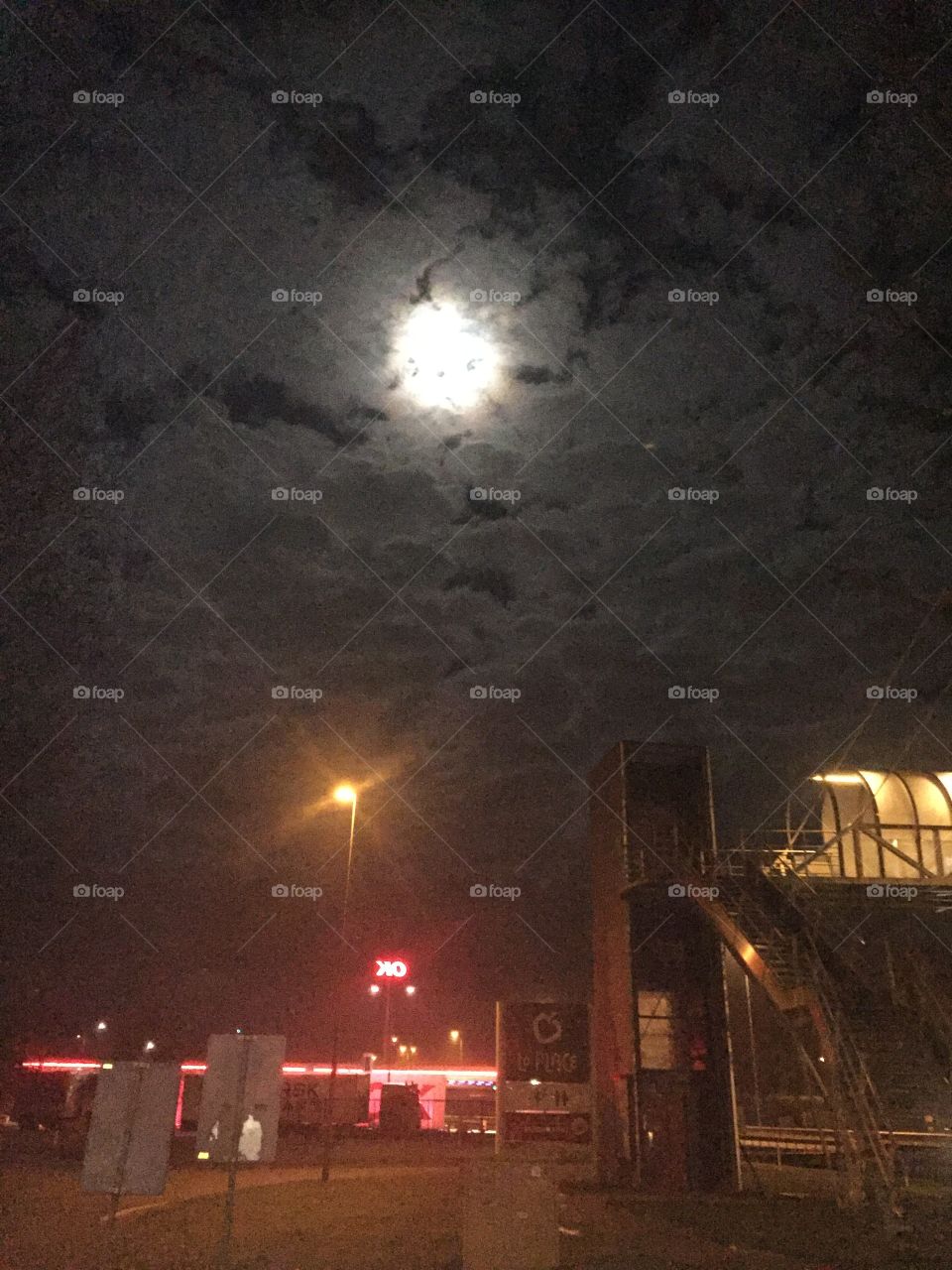 Moon behind clouds