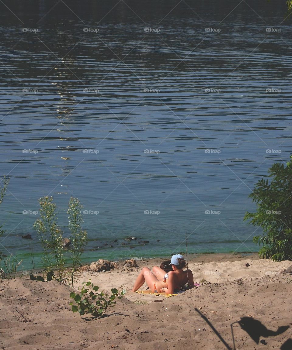 girl on the beach of the Dnieper river