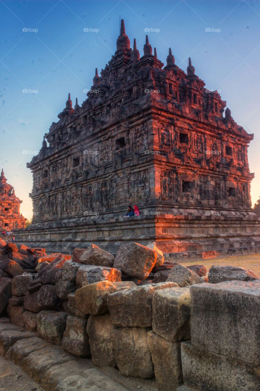 big temple shining red by sunset