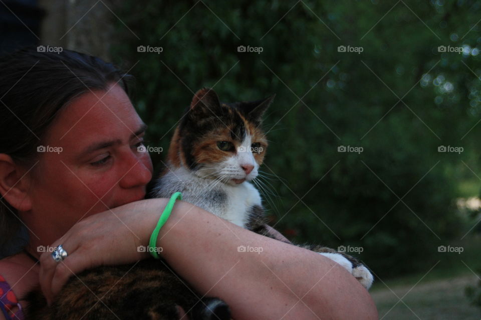 A lady and a cat. 19 years old deaf cat at holiday camp in France