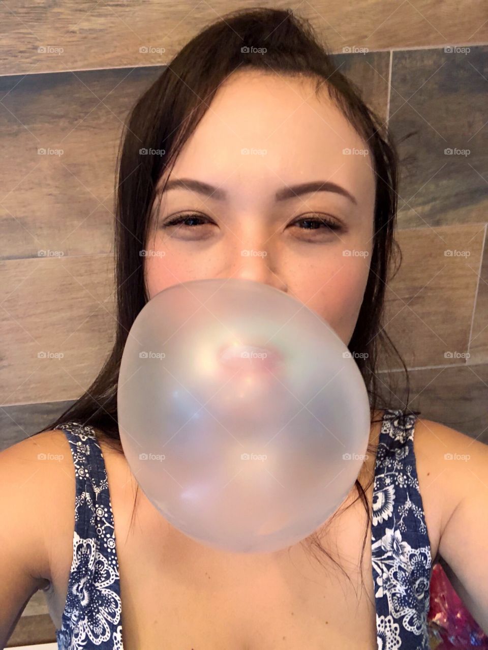 blowing bubblegum ball