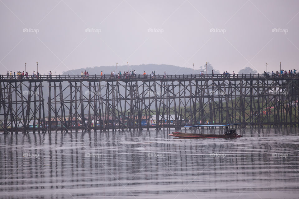 Boat and wood bridge in Sagklaburi Kanchanaburi Thailand 