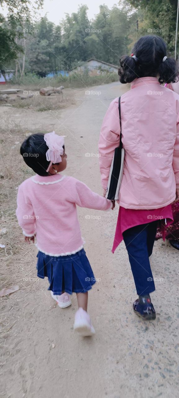 sisters are always special.they play a role of elder sister as well as mother .elder sister taking care of her younger sister.