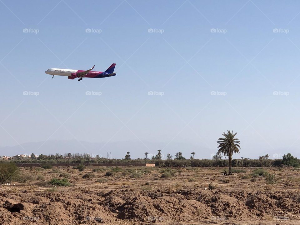 beautiful aircraft flying cross the blue sky