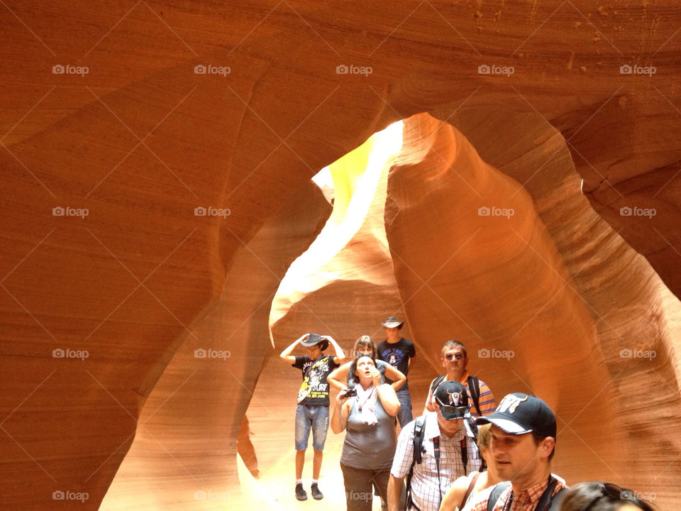 tourists cave antelope canyon sand stone by ilyapon
