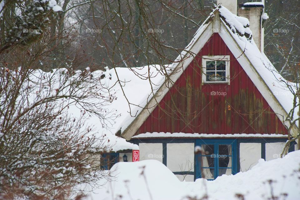summer house in winter. traditional half-timberd house in scania