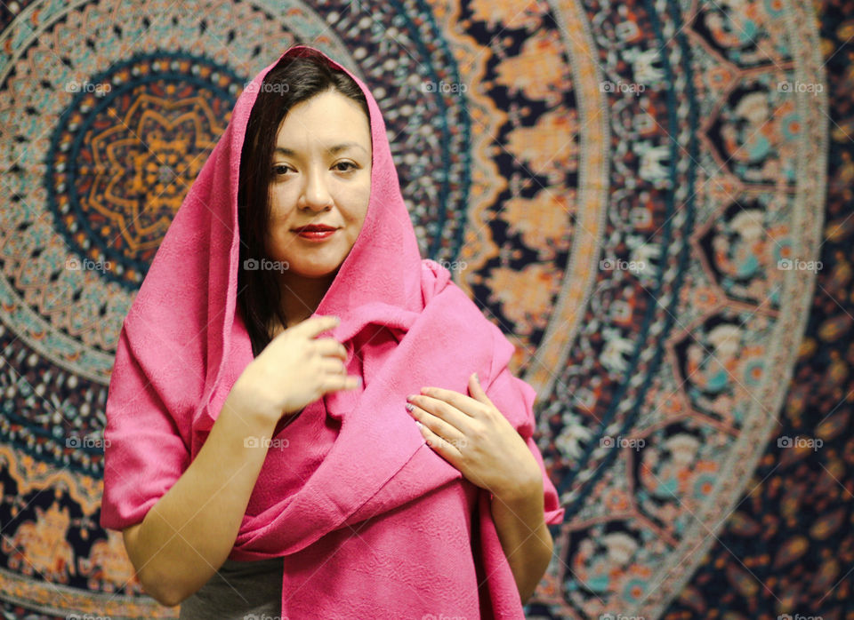 woman wearing traditonal pink scarf