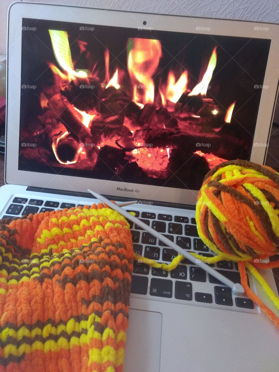 knitting, laptop, fireplace