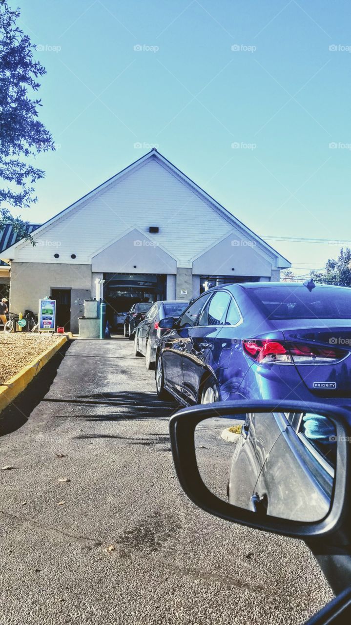 Cars in line at the carwash