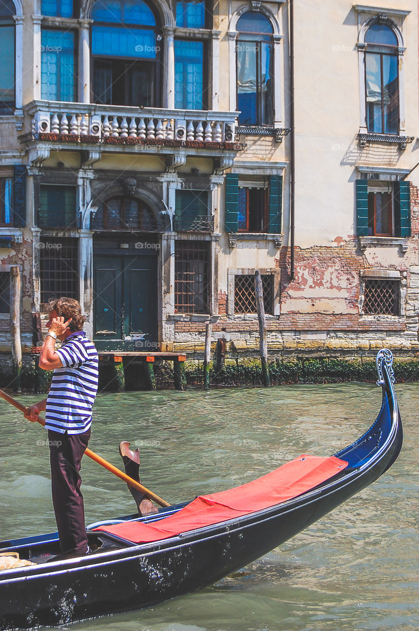 Gondolier on the phone