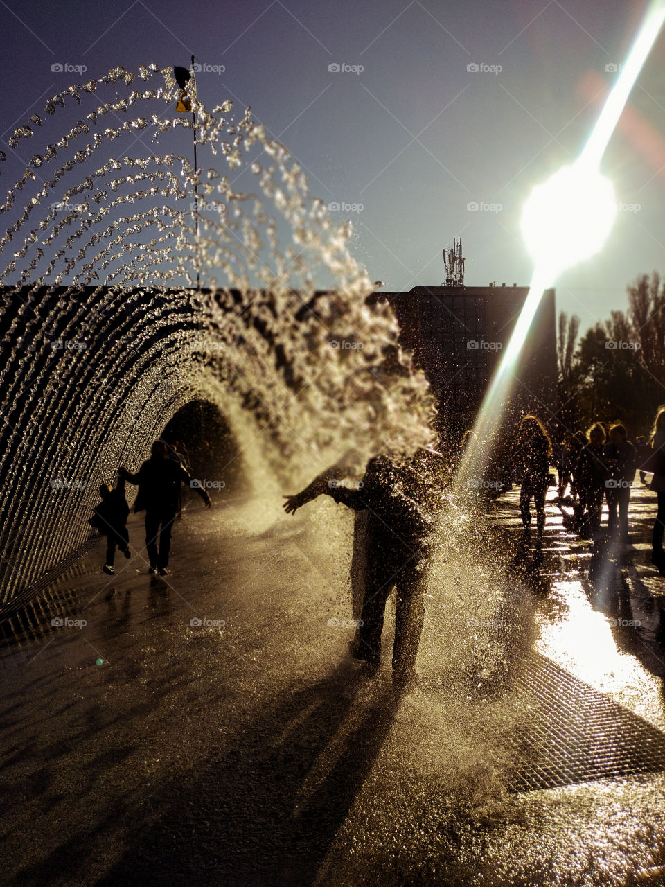 people under the fountain