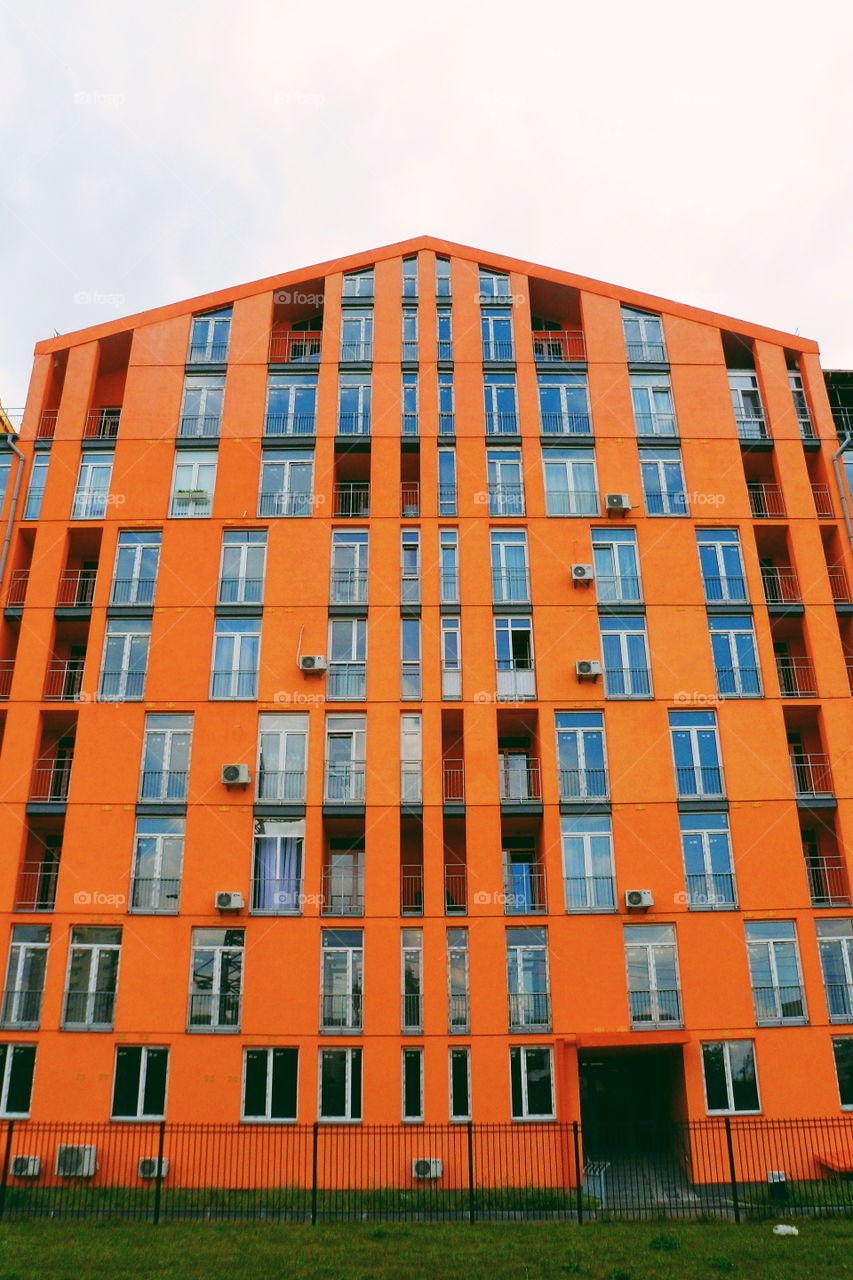 Orange facade of the building