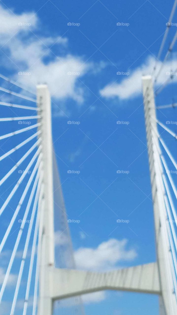 blue sky and tall bridge