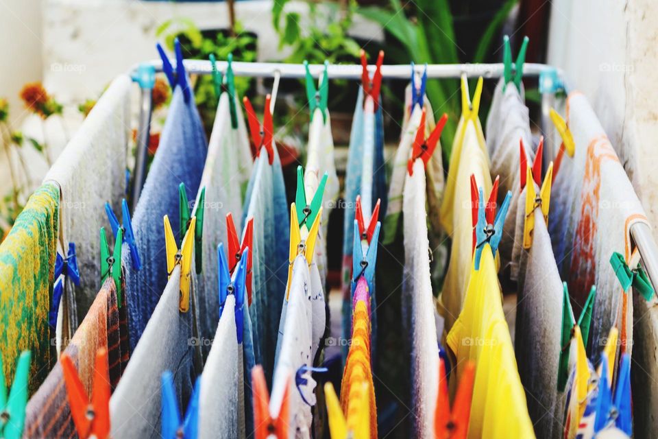 Colorful laundry and clothespins 