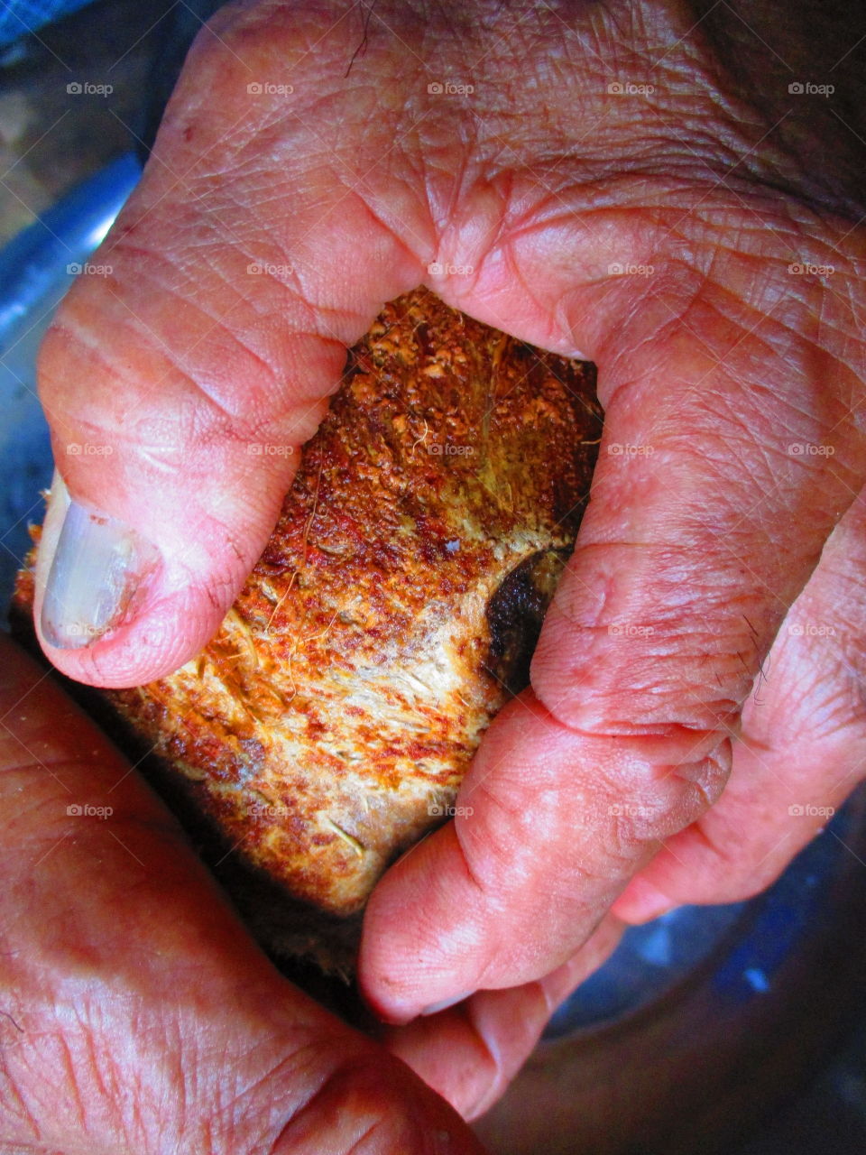 working hand with coconut