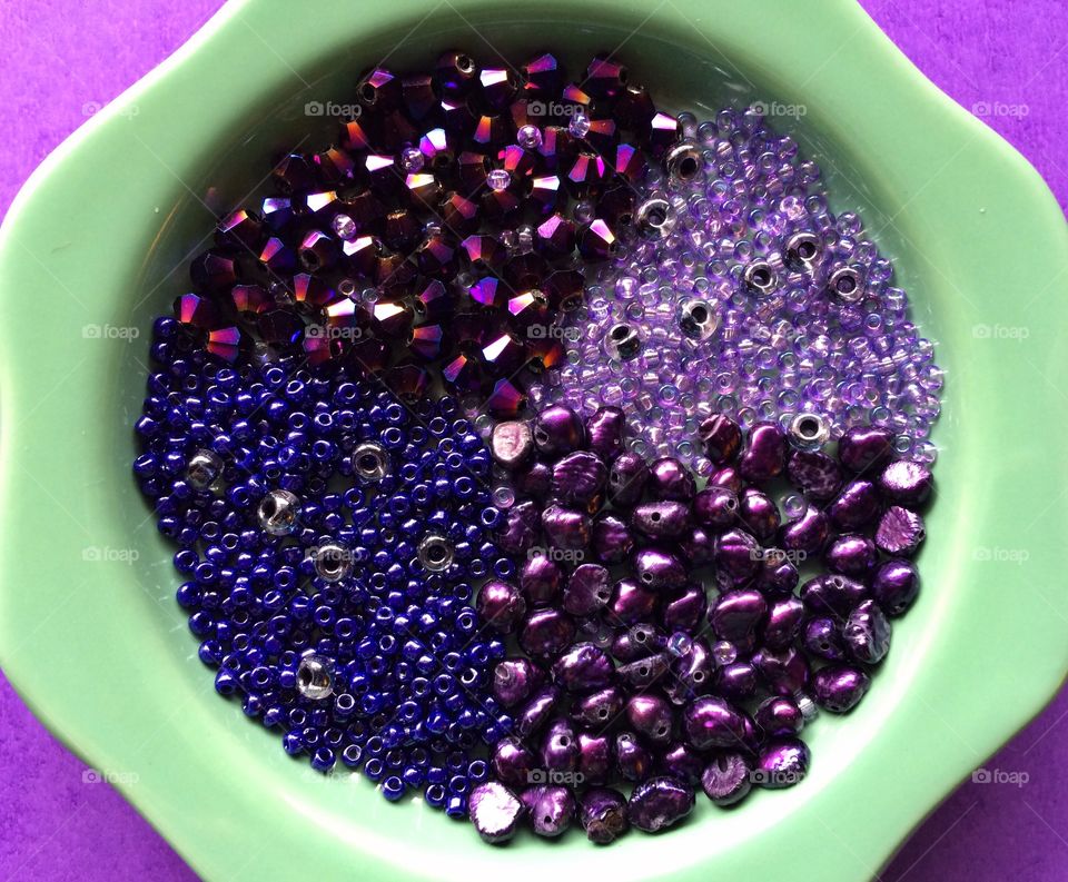 Variety of decorative beads in bowl