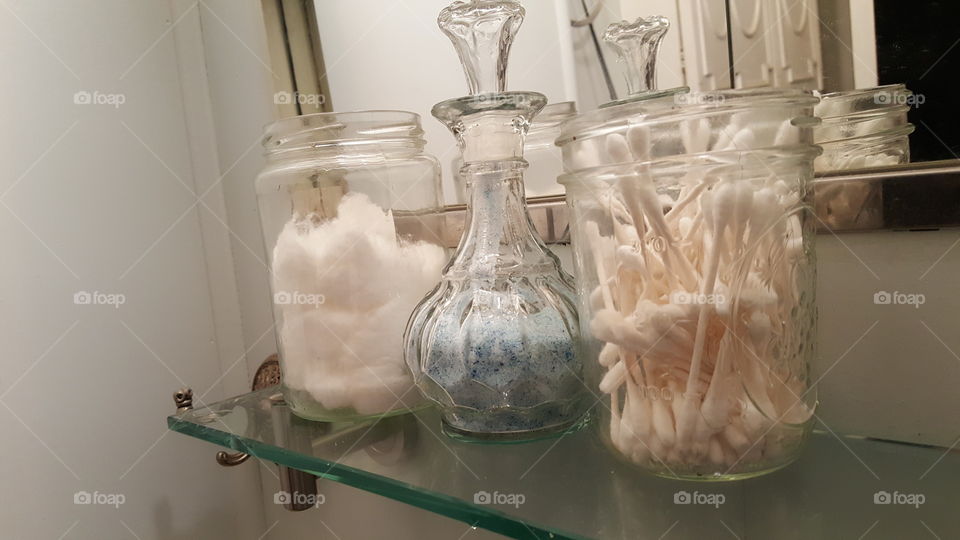 bathroom mirror bath salt q-tip jar organization cotton ball shelf