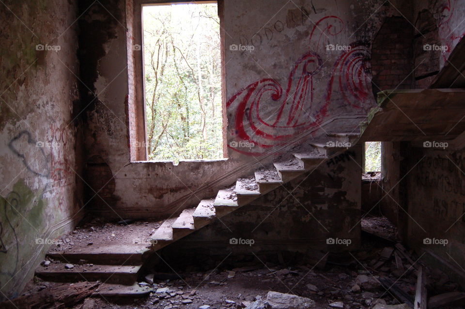abandoned staircase. collecting pictures in an abandoned building 