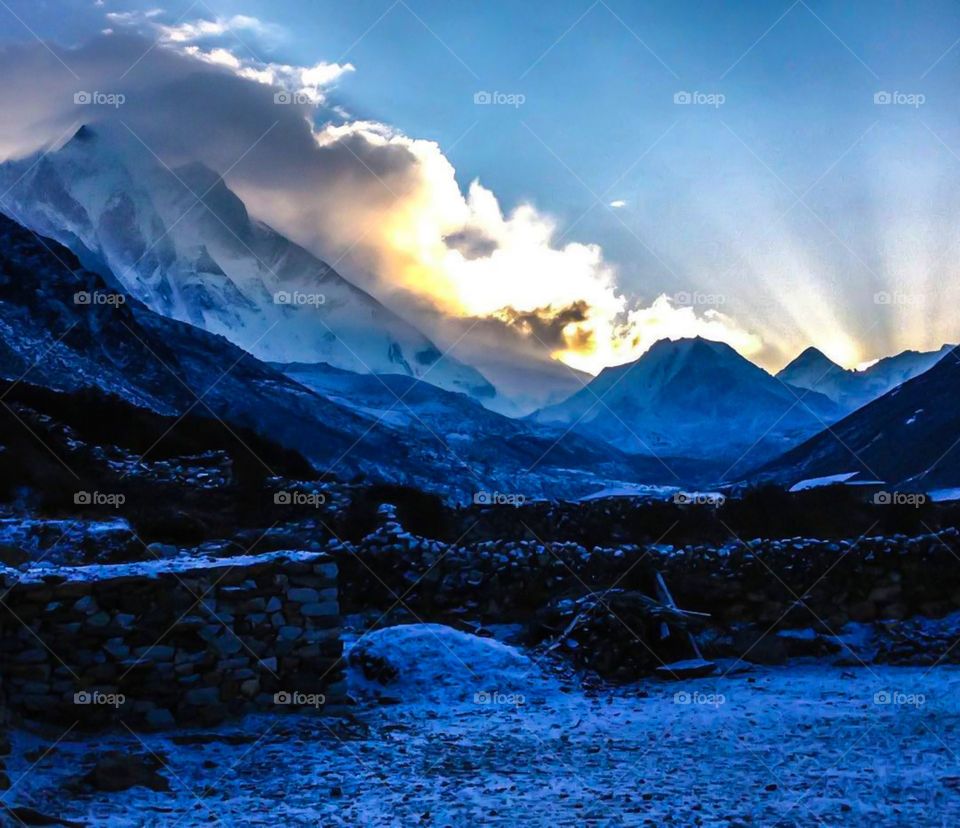 A cold morning as the sun comes up over Mt. Lhotse. Photo taken at Dingboche on the way to Everest Base Camp in Nepal.