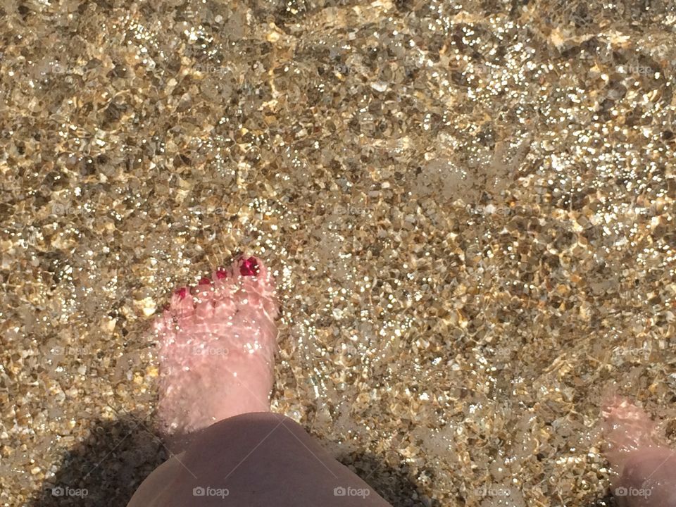 Foot in ocean 