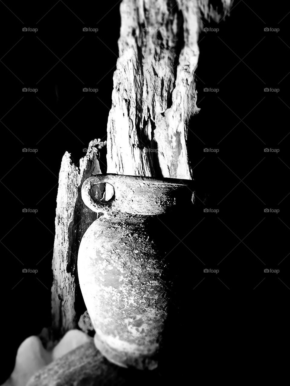 In the sepia whispers of an old jar, memories of our past dance like dust  motes captured thru my lens.