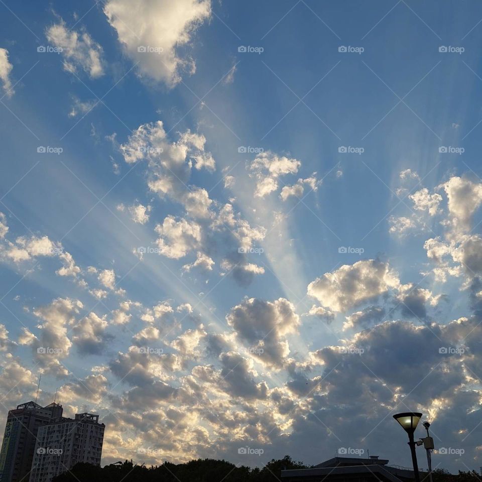 Crepuscular rays in the city