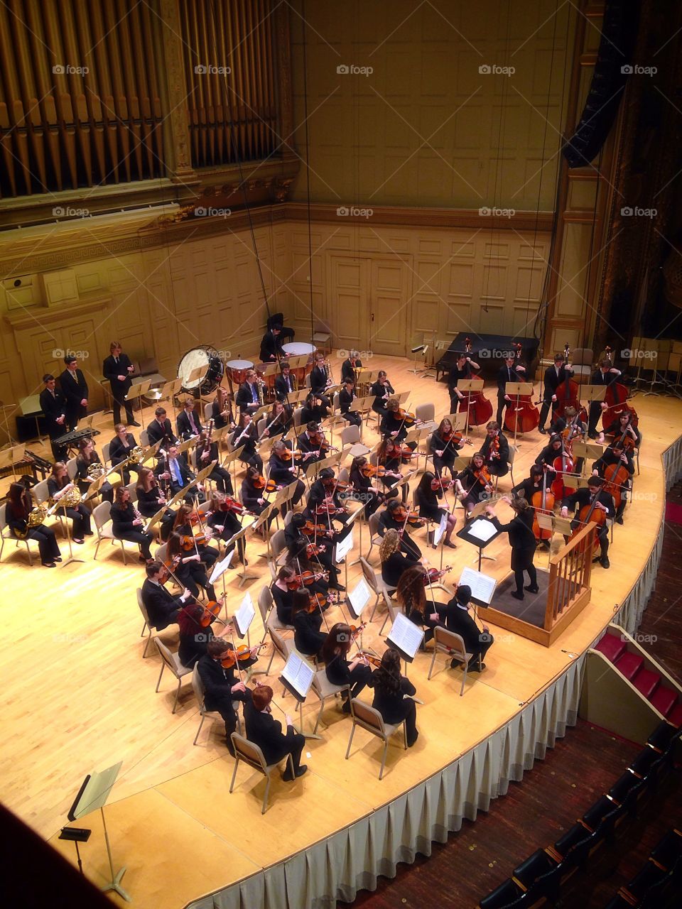 Orchestra . High school orchestra at Boston Symphony / musical instruments mission