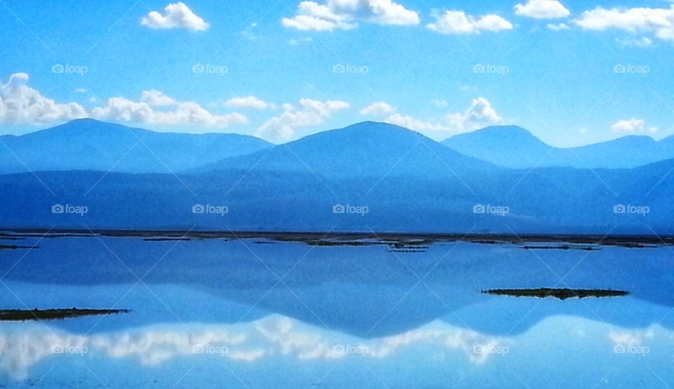 Reflection of the mountain and clouds in the water, reflection,Mountain,clouds,water, reflecting,blue,landscape,nature,colorful,sunset,double