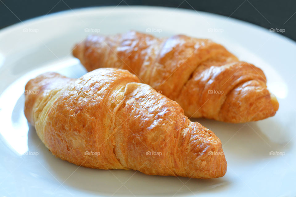 Croissants on a white plate