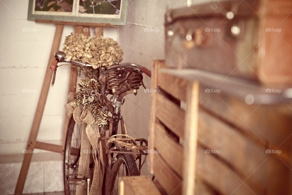 An old bicycle and other memories in an attic 