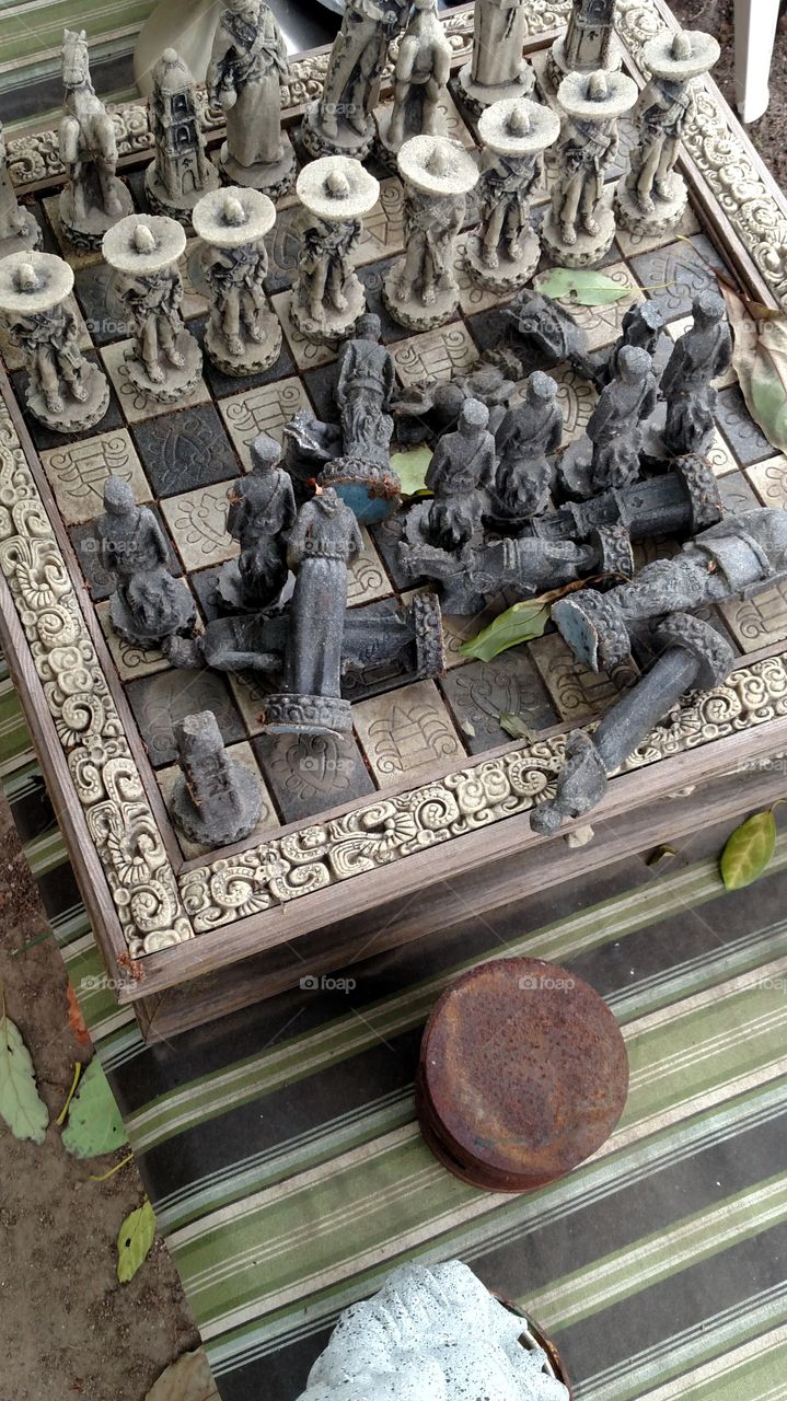 ancient chess. an old, stone chessboard