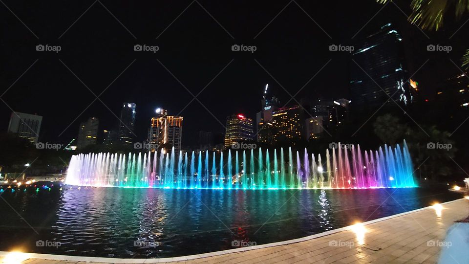 Artificial lake at night in KLCC Malaysia