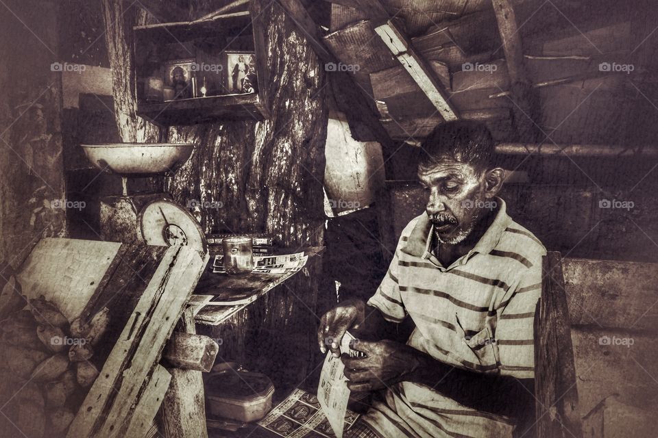 Senior man working in his workshop