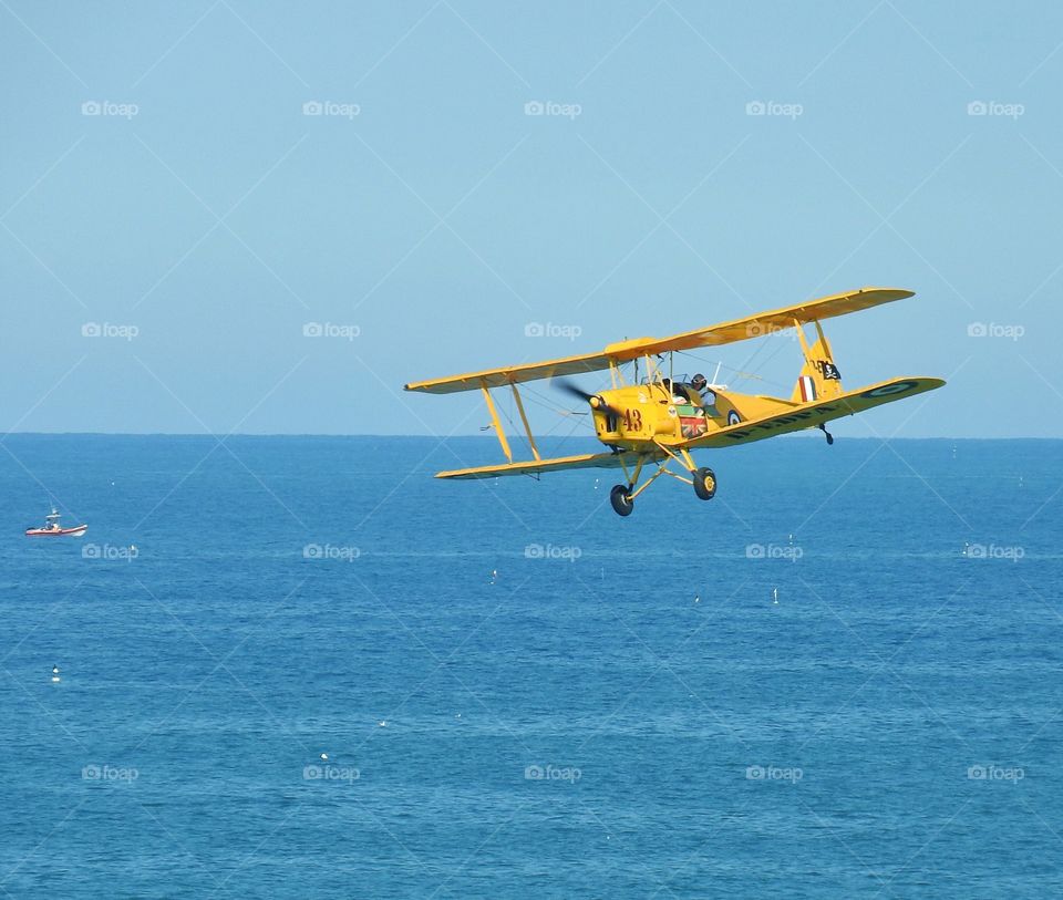 Airplane over the sea 