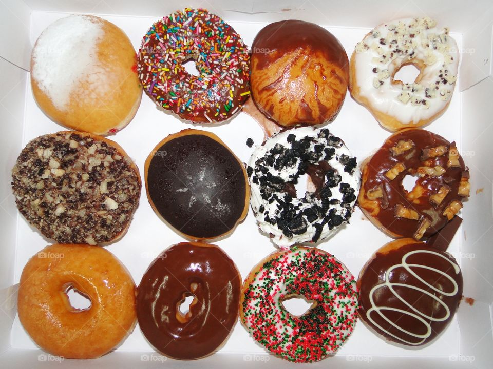Different flavours of sweet, tasty and delicious doughnuts.