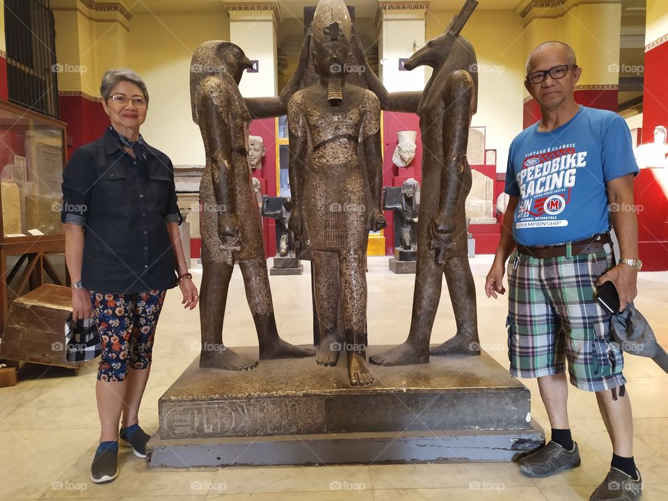 lovely photo with the famous status inside the Egyptian museum cairo with a god Anubis.
