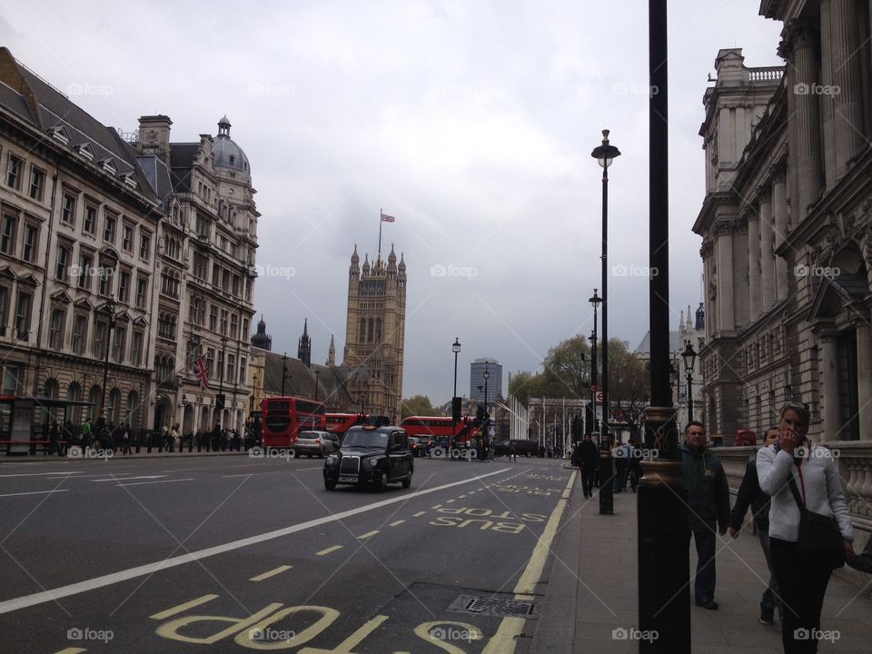 London Town . Double decker bus, black cabs Westminister Palace, London