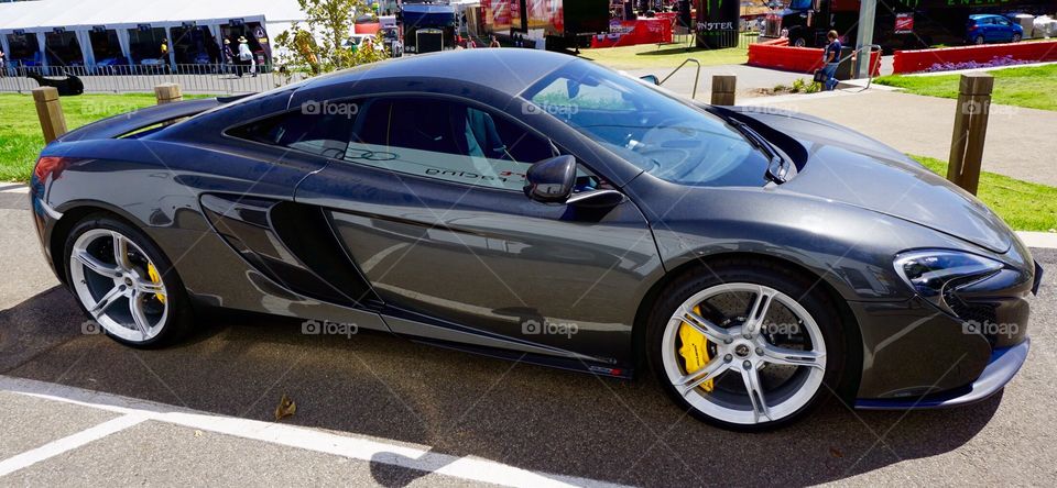 Mclaren 650S sports car. Grey Mclaren 650S sports car exotica