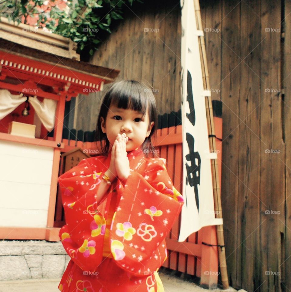 Japanese girl praying