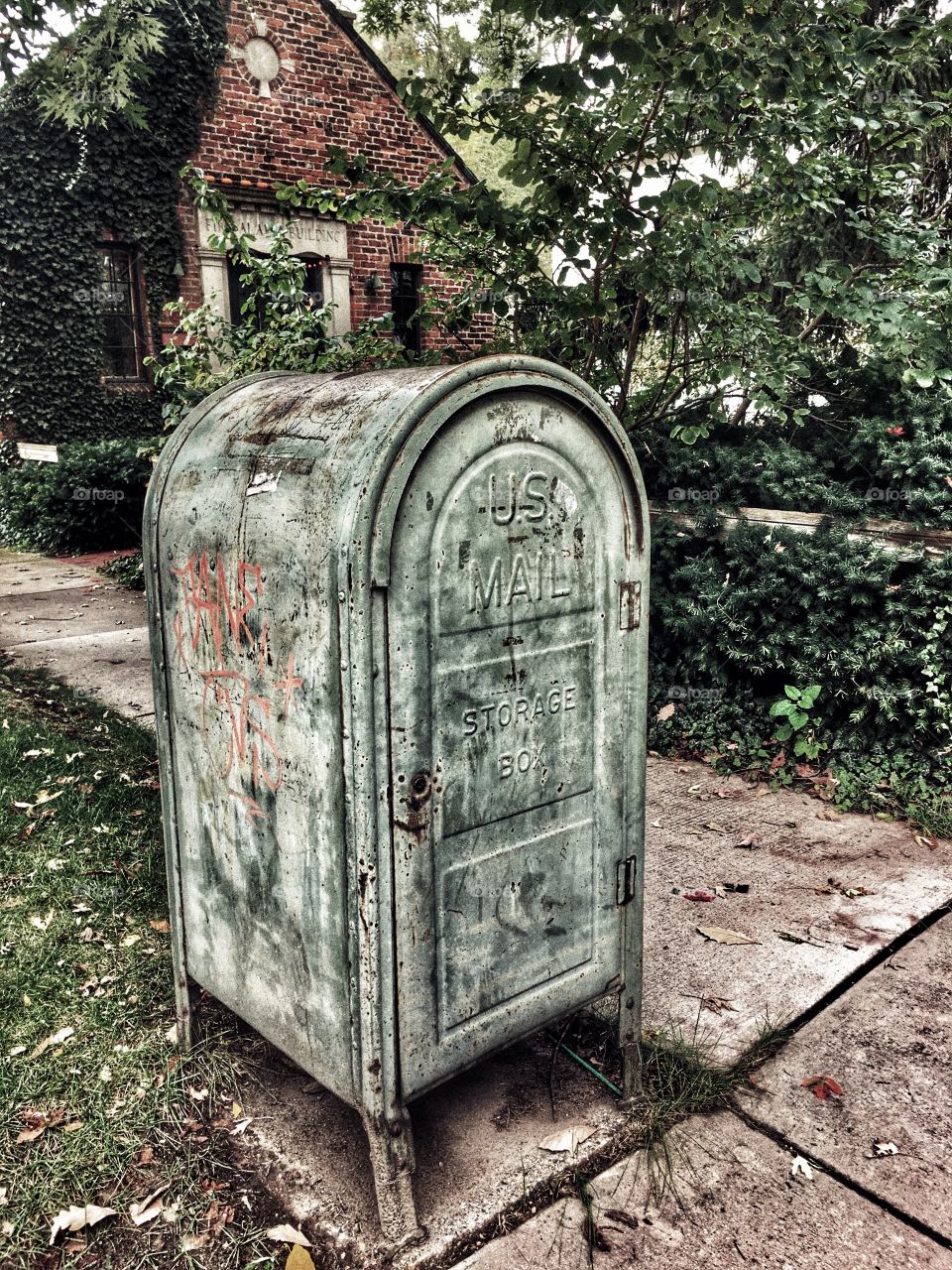 Old mailbox in lawn