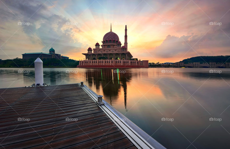 Blessing Sunrise. Sunrise reflections over Putra Mosque Putrajaya, Malaysia