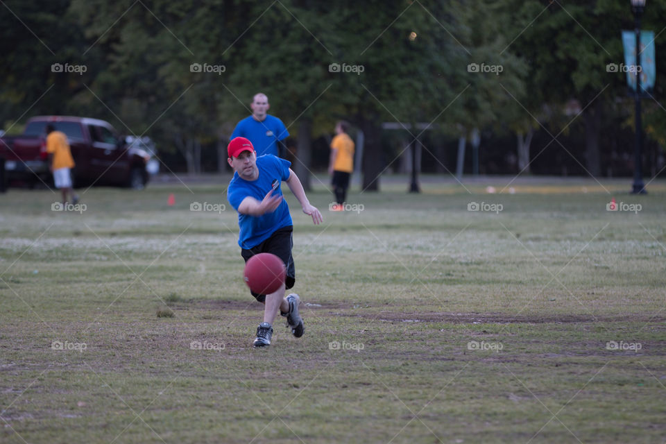 Man playing ball in the park