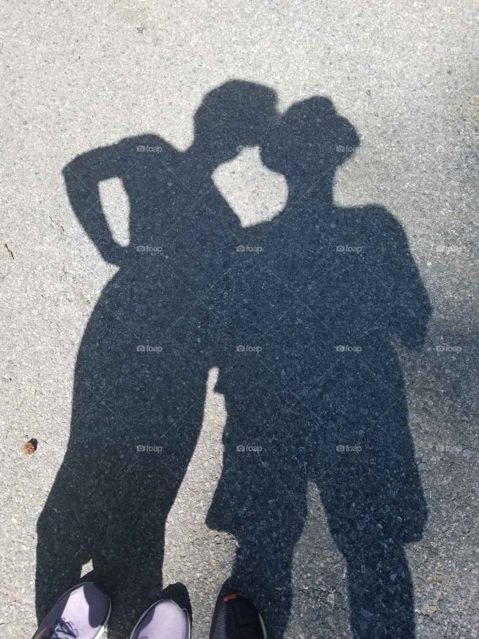 people shadows on street