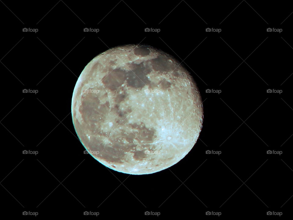 Picture of a just past full moon. It was my very first set of moon pics with clarity & detail that I have ever managed to capture. This version I only slightly adjusted the contrast to capture some depth to the craters, otherwise it is au naturel! ๐